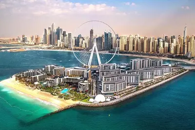 an island in the ocean with a large city at Livbnb - Alluring 3BR Plus Maid's with Sea & Ain Dubai View in Dubai