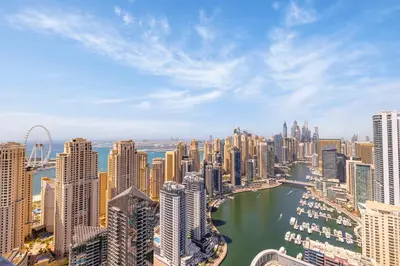 an aerial view of a large city with a harbor at Daniels Marina View 4BR Duplex in Stella Maris in Dubai