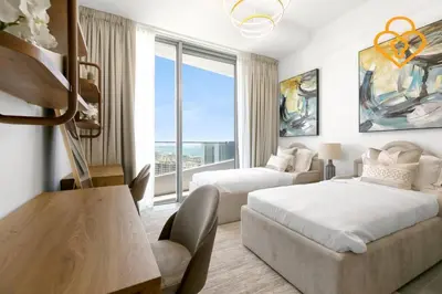 a bedroom with two beds and a large window at Keysplease Luxury 3 B/R Fascinating Sea & Dubai Marina Views in Dubai