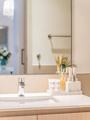 a bathroom with a sink and a mirror at Stylish 1BR in Park Heights 2 - Dubai Hills in Dubai