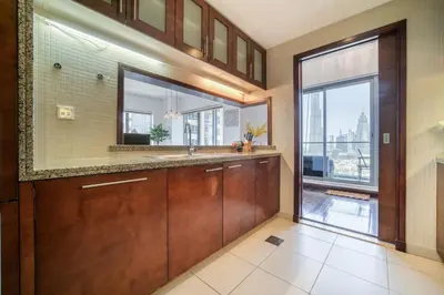 a bathroom with a sink and a large window at South Ridge 2, Downtown Dubai - Mint Stay in Dubai