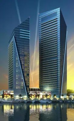 two tall buildings next to a body of water at Panoramic Luxe 1BR with Breathtaking Views at Dubai Marina Near JBR - Silverene Towers in Dubai