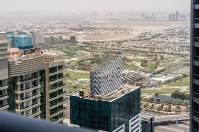 an aerial view of a building in a city at 76th floor- 2 BR Apartment with Iconic Marina Skyline View in Dubai