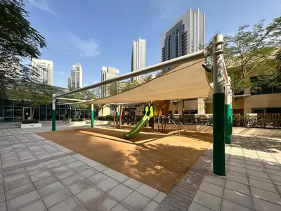 a playground with a tent and a slide at Trophy Lux 2BR Creek Harbour Suites with Iconic Burj Khalifa Views in Dubai