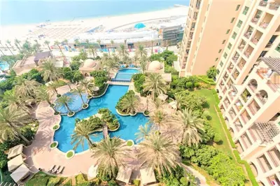 an aerial view of the pool at the resort at NEW! Exclusive Fairmont Penthouse private Pool-Gym in Dubai