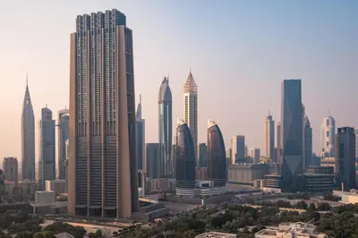 a city skyline with tall skyscrapers at Prime Retreats @ Downtown Views by Emaar in Dubai