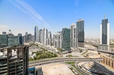 a view of a large city with tall buildings at Silkhaus elegant and luxury 1BDR Downtown in Dubai