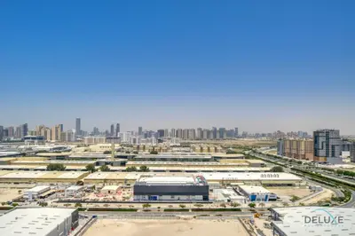 an aerial view of a city with buildings at Prime Studio at Mesk 1 Midtown Dubai Production City by Deluxe Holiday Homes in Dubai