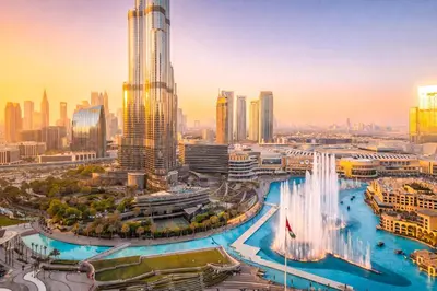 a view of a city with a fountain and skyscrapers at Elite Royal Apartment - Full Burj Khalifa & Fountain View - King in Dubai