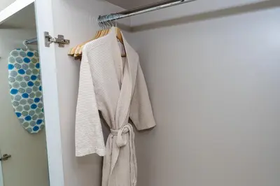 a towel hanging on a towel rack in a bathroom at CitiHome -1BR with Balcony & Pool View in Zada Tower in Dubai