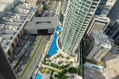 an aerial view of a city with tall buildings at Chic & Trendy 3BR+kid's in Vibrant Downtown Dubai in Dubai