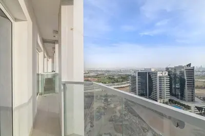 a balcony with a view of a city at Silkhaus luxurious 1BDR in AG Tower, Business Bay in Dubai