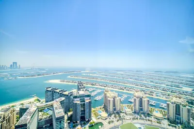 an aerial view of a city with a harbor at Heavenly Studio at The Palm Tower Palm Jumeirah by Deluxe Holiday Homes in Dubai