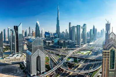 an aerial view of a large city with highways at Silkhaus modern 1BDR in Downtown with balcony, pool, gym in Dubai
