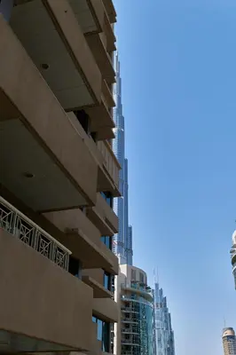 a view of a city skyline with tall buildings at Bellavista - Striking - 1BR with Extra Twin Room - 29 boulevard - Partial Fountain View in Dubai