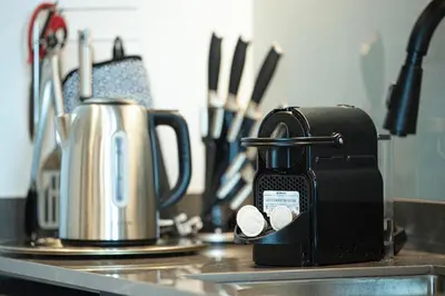 a toaster sitting on top of a kitchen counter at The Suite Dubai 15 Northside Luxury Living in Dubai