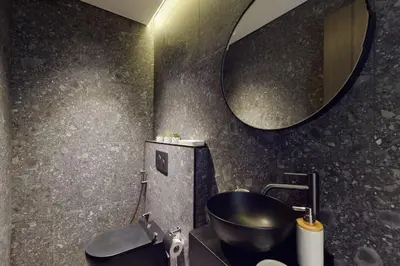 a bathroom with a sink and a mirror at O Ten, Al Jaddaf - Smart One Bedroom in Dubai