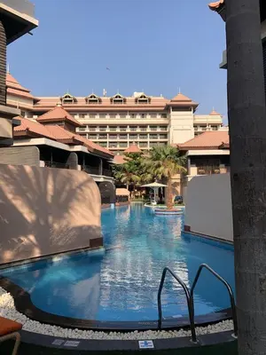 a view of a swimming pool in a hotel at GuestReady - Burj Al Arab view at Royal Amwaj in Dubai