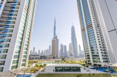 a view of a city skyline with tall buildings at 3BR facing Dubai Mall 5 min walk to Burj Khalifa in Dubai