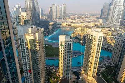 an aerial view of a city with tall buildings at Bellavista - High Floor - 1BR 29 Boulevard - Burj Khalifa & Fountain View in Dubai