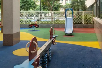 a playground with several different types of playground equipment at Bellavista - High Floor - 1BR 29 Boulevard - Burj Khalifa & Fountain View in Dubai