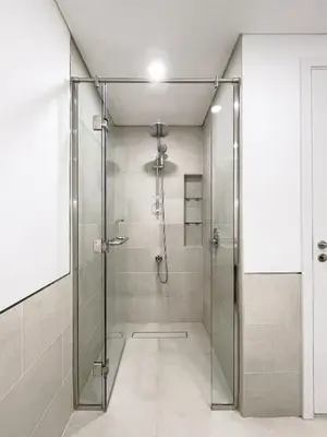 a shower with a glass door in a bathroom at Spacious 2 bedroom in Madinat Jumeirah Living in Dubai