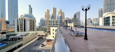 a view of a city with buildings and street lights at 50% OFF Summer Offert, Nice w/ Balcony & Pool View in Dubai