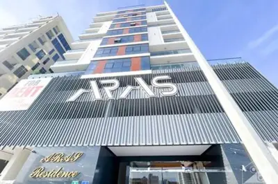 a tall building with a ra sign on it at Cozy Spacious Studio With Balcony Dubai in Dubai