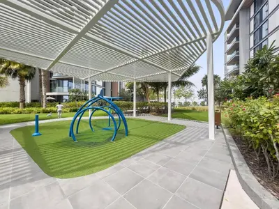 a playground under a canopy in a courtyard at New 2 bedroom in Bluewaters with Direct Sea View in Dubai