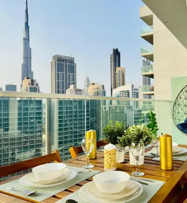 a table with a view of a city skyline at In the heart of Business Bay - Bills included in Dubai