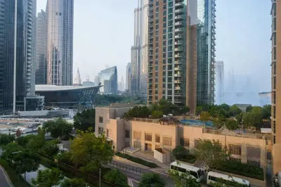 a view of a city with tall buildings at Maison Privee - Luxury 2Bedroom with Burj Khalifa & Fountain Views in Dubai