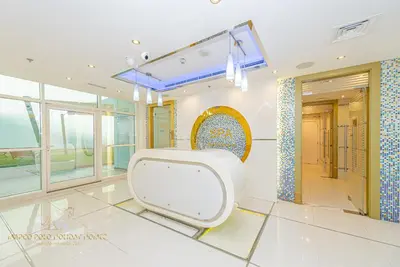 a bathroom with a white toilet in a room at Marco Polo - Enjoy comfort and class near Burj Khalifa in Dubai