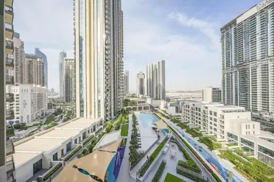an aerial view of a city with tall buildings at Elegant Apartment With Balcony Amidst Vibrant Area in Dubai