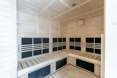 a sauna with wood floors and a ceiling at Contemporary Ranch Living with Burj Khalifa View in Dubai