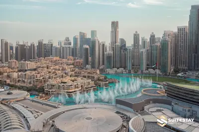 an aerial view of a city with a water fountain at Fashion Avenue Dubai Mall in Dubai