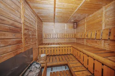 an empty wooden sauna with a toilet in it at 1Br Suit with Full Canal View - Down Town in Dubai