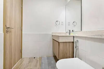 a bathroom with a toilet and a sink at Luxurious 3BR Villa Amaranta in Dubai