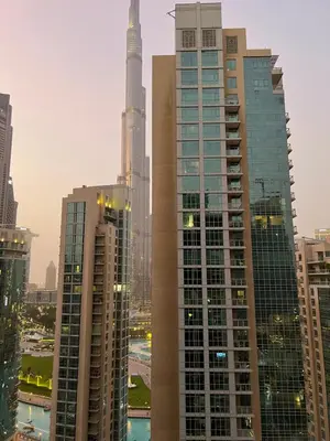 a view of a city with many tall buildings at INA Homes-BLVD Central 2BHK Apartment near Burj Khalifa in Dubai