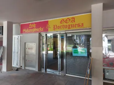 a store front with a sign above the doors at White Sage - Gorgeous Apartment in JLT Near the Metro Station in Dubai