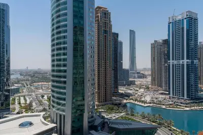 a view of a city skyline with tall buildings at Summer Deal! Stylish 1 BR in Jumeirah Lake Towers in Dubai