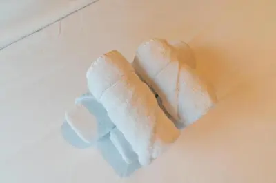 two rolls of bread sitting on top of a table at Summer Deal! Stylish 1 BR in Jumeirah Lake Towers in Dubai
