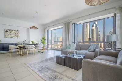 a living room with a couch and a table at Frank Porter - South Ridge 6 in Dubai