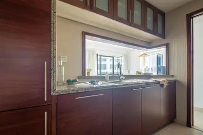 a kitchen with a sink and a window at Frank Porter - South Ridge 6 in Dubai