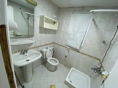 a bathroom with a sink and a toilet and a shower at Relaxing Private Rooms in Compound Housing near Burj Alarab Villa 124 in Dubai