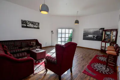 a living room with a couch and two chairs at Relaxing Private Rooms in Compound Housing near Burj Alarab Villa 124 in Dubai