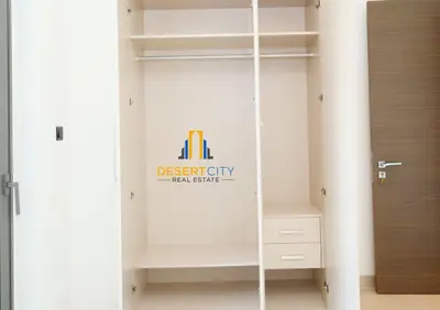 a closet with a sign that reads disregard city real estate at Fully Furnished 1 Bed in Sobha Creek Vista hosted by Desert City Stays in Dubai