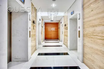 a hallway in a building with a door at Sparkle Tower - Studio, Dubai Marina in Dubai