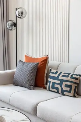 a couch with pillows on it in a living room at Frank Porter - 15 Northside Tower 2 in Dubai