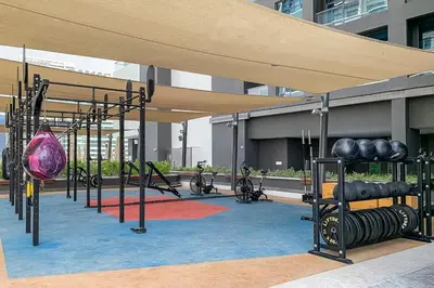 a gym with lots of exercise equipment in a building at Frank Porter - 15 Northside Tower 2 in Dubai