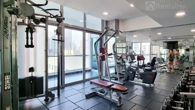 a gym with treadmills and machines in a building at Luxury Stop w/ BoHo Design & Sea View in Marina in Dubai